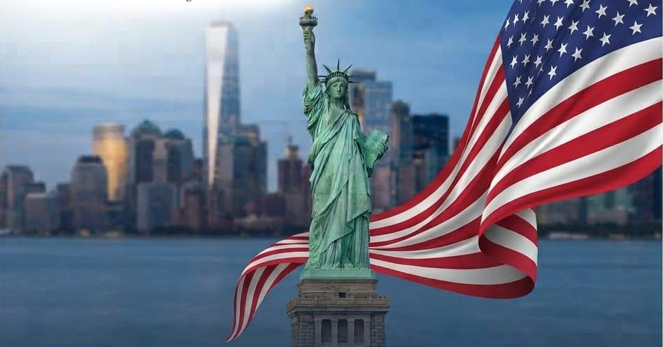 Statue of Liberty, the American flag and the New York skyline